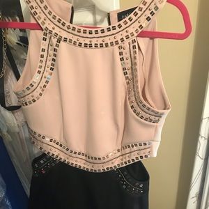 Short Fabrik tan and black dress. Size large